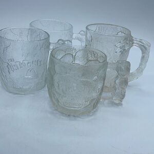 1993 set of 4 The Flintstones glass mugs from McDonalds ( RocDonalds ) .